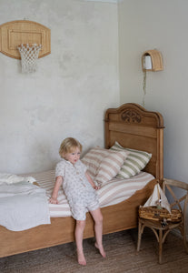 Beautiful soft striped single bedding with neutral colours on sleigh bed. 100% certified GOTS Organic Cotton.