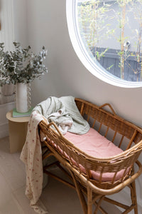 The best ethically made GOTS organic cotton fitted bassinet sheets. So soft in crinkled design