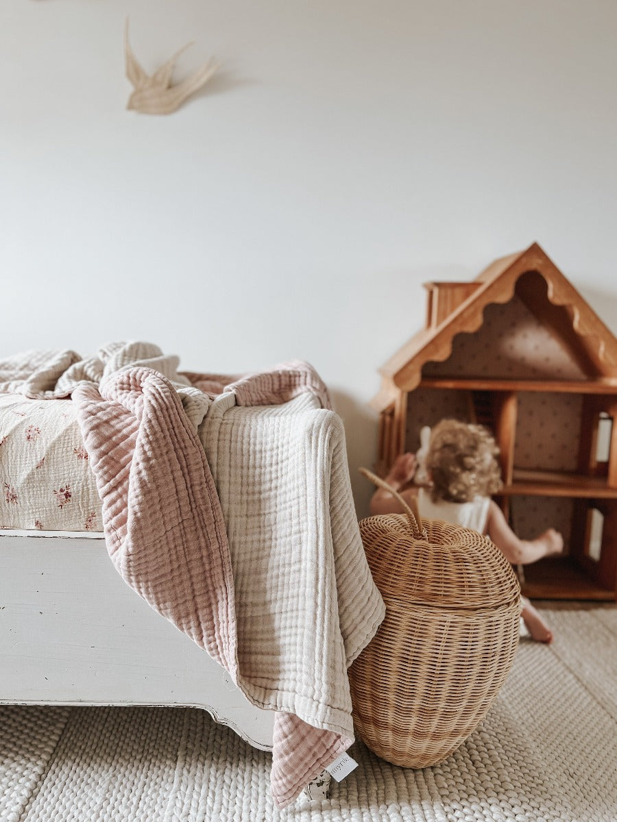 The best GOTS Organic Cotton Baby Bassinet Sheet with a vintage scandi feel and an Australian Wax Flower design on a neutral background