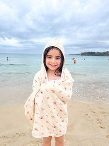beautiful neutral GOTS Organic Cotton hooded towel with scandi vintage design and Australian pink wax flowers