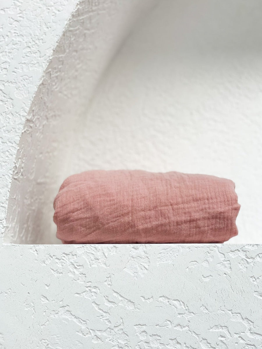 This gorgeous pure cotton gauze bassinet sheet in pink salt is made from 100% GOTS organic cotton. It is perfect for baby to sleep on. It is so soft and luxurious and looks great too.