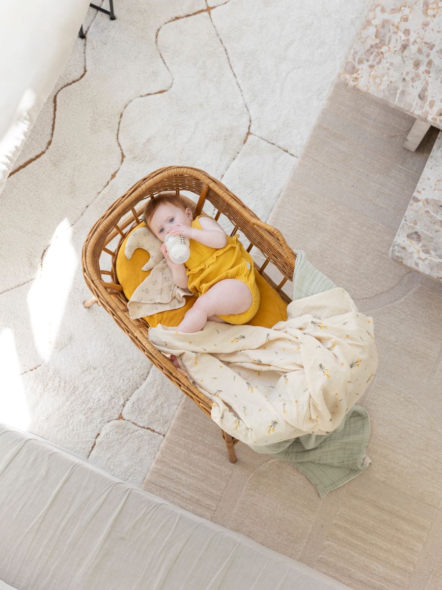 The best low-tox bassinet and cot sheets, scandi floral swaddles, and crinkled gauze blankets made from 100% GOTS organic cotton.