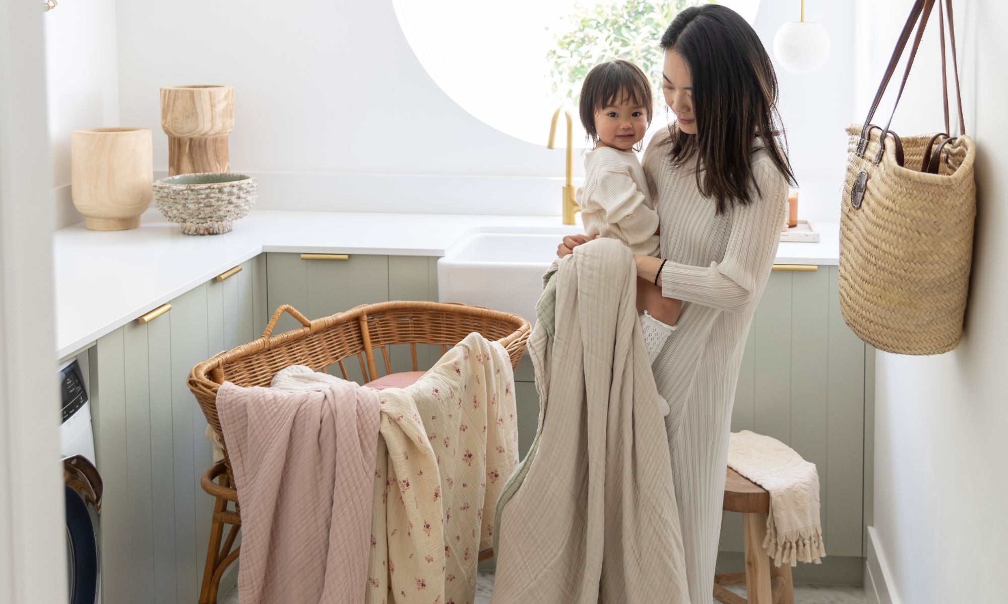 The best low-tox bassinet and cot sheets, scandi floral swaddles, and crinkled gauze blankets made from 100% GOTS organic cotton.