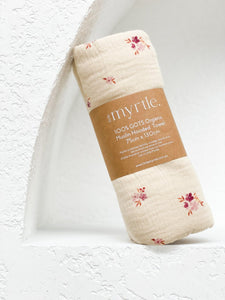 beautiful neutral GOTS Organic Cotton hooded towel with scandi vintage design and Australian pink wax flowers