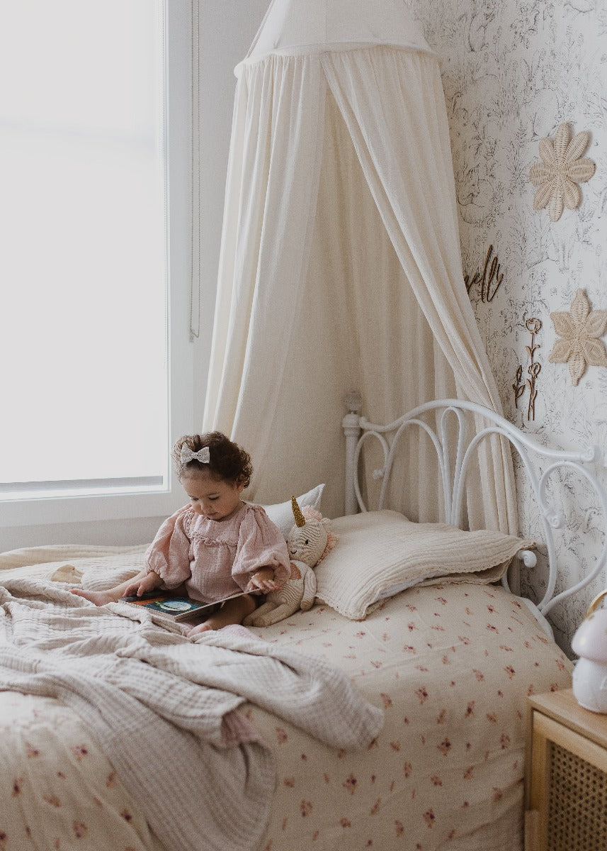 Stunning room for a toddler with flower wallpaper, gorgeous light and the most beautiful 100% GOTS organic cotton bed sheets with a vintage feel and Aussie inspired natives to make bedtime that extra special. Parents love the best cotton bed sheets for kids.